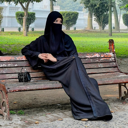 Zimal Elite Dubai Abaya – Sitting View – Dubai-made Dubai Abaya – Jilbab.pk